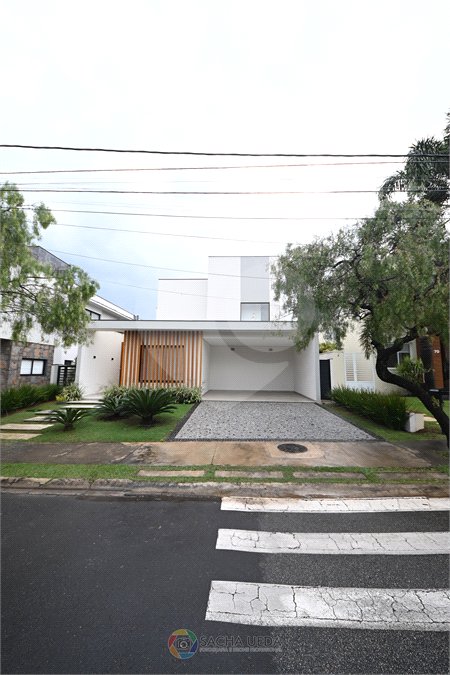 Indaiatuba - SP - Condomínio Helvetia Park - 490 m² Terreno - Sobrado com 307 m² de Área Construída - Escritório com móveis planejados - Sala de estar e jantar ampla e integradas - Cozinha planejada completa, com eletrodomésticos (cooktop, forno, coifa, geladeira, microondas) - Lavanderia