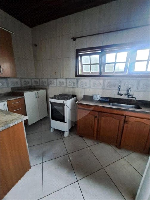 Casa à venda com 4 quartos, sendo 1 suíte, em Indaiá, Caraguatatuba, SP