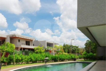 Casa à venda com 4 suítes no condomínio Figueira Garden, Atibaia - SP