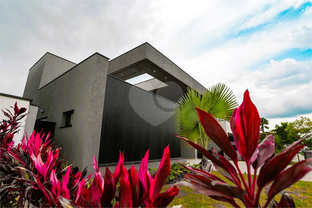 Casa à venda com 4 suítes no condomínio Alphaville Nova Esplanada 4, Votorantim - SP