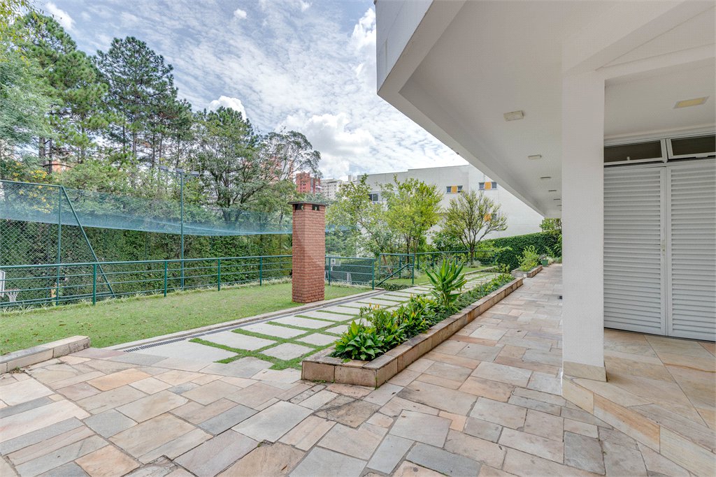 Casa à venda com 4 suítes no condomínio Granja do Morumbi, São Paulo - SP