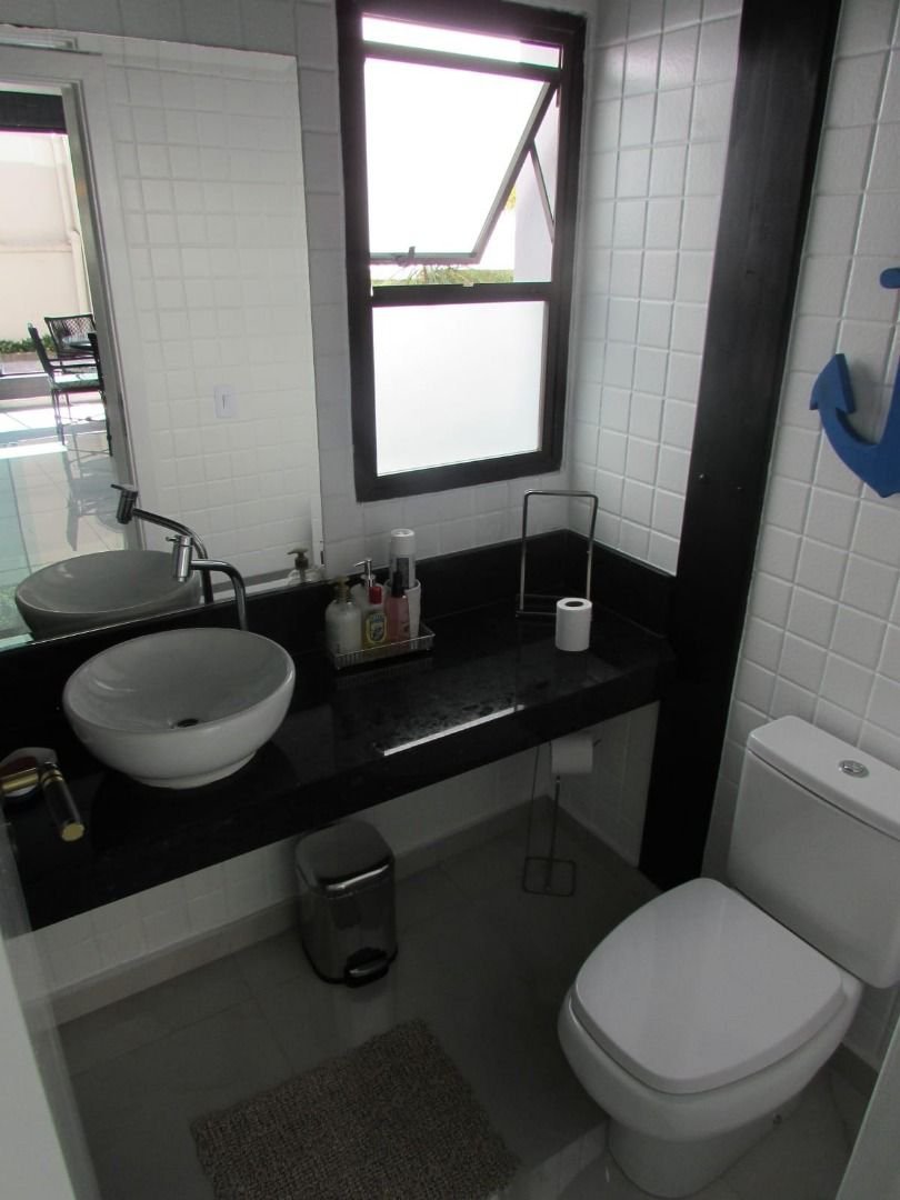 Casa de Alto Padrão com 5 Suítes e Lazer Completo– Guarujá