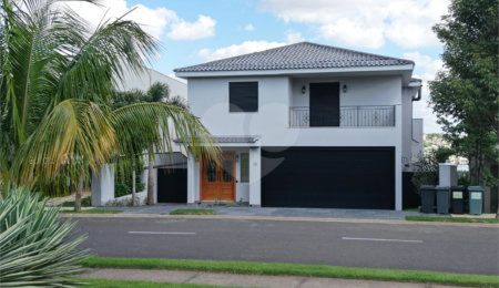 Casa à venda com 4 suítes no condomínio Alphaville Dom Pedro 3, Campinas - SP