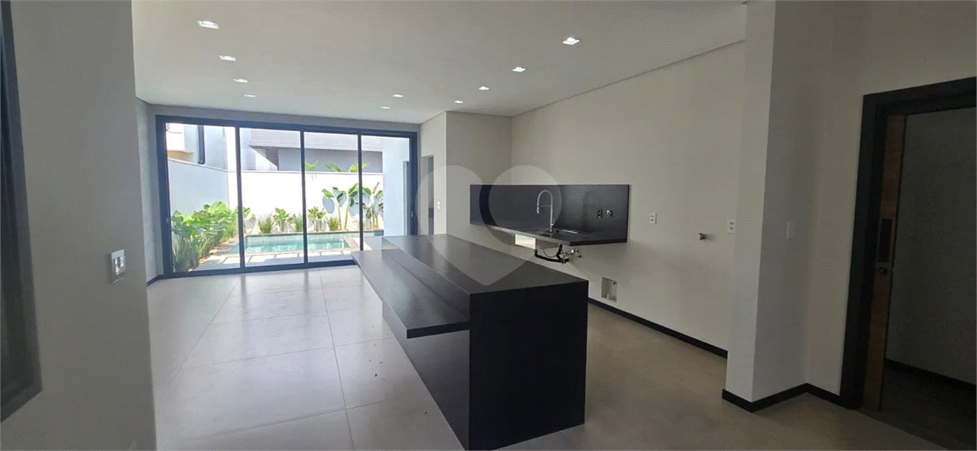 Casa à venda com 5 suítes no condomínio Parque Faber IV, São Carlos - SP
