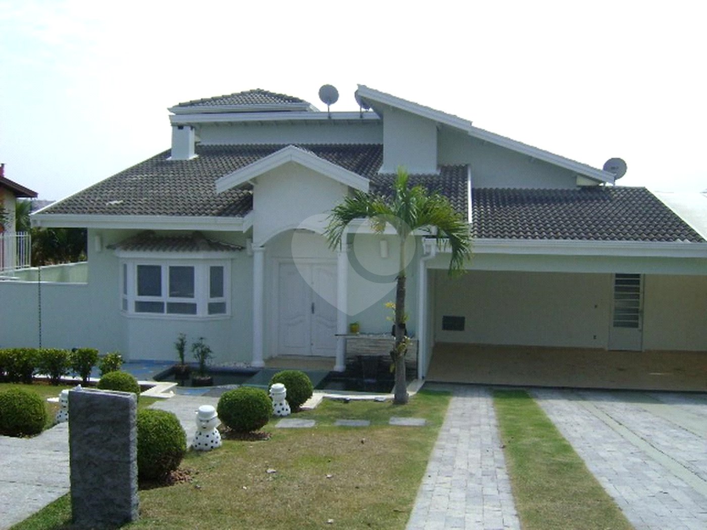 Casa à venda com 3 suítes no condomínio Estância Marambaia, Vinhedo - SP