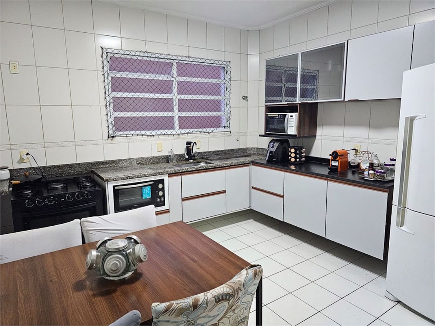 Casa com 5 dormitórios à venda, 220 m² por R$ 1.600.000,00 - Boqueirão - Santos/SP