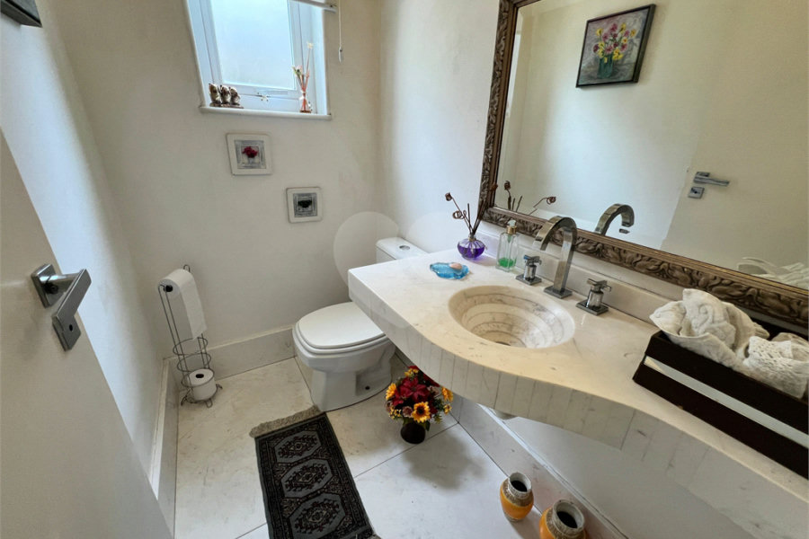 Casa à venda com 3 suítes no condomínio Quinta de Santo Antônio, São Paulo - SP