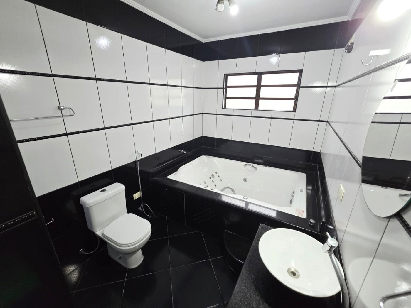Casa com 3 dormitórios à venda, 150 m² por R$ 960.000,00 - Macuco - Santos/SP