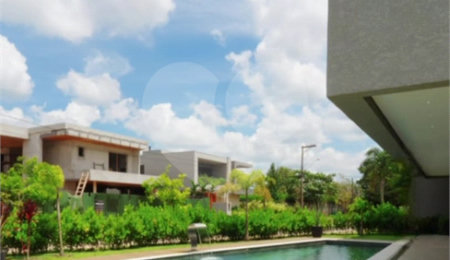 Casa à venda com 4 suítes no condomínio Figueira Garden, Atibaia - SP