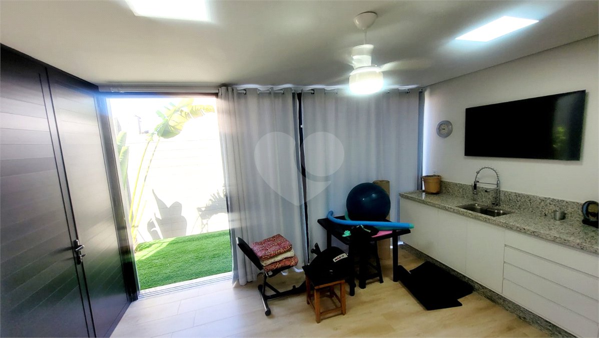 Casa à venda com 4 suítes no condomínio Sta Morriz, Campinas - SP