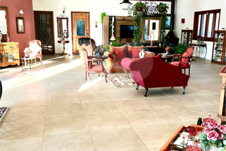 Casa à venda com 4 suítes no condomínio Residencial Vale das Laranjeiras, Indaiatuba - SP