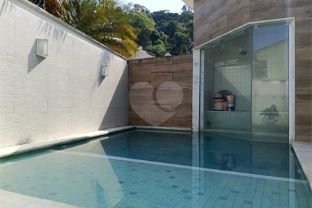 Casa à venda com 4 quartos, sendo 1 suíte, no condomínio Atlantico Sul, Rio de Janeiro - RJ