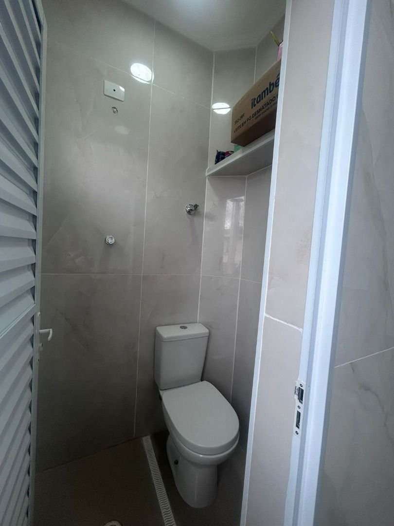 Casa com 2 dormitórios para alugar, 120 m² por R$ 5.000,00/mês - Encruzilhada - Santos/SP