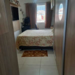 Casa com 3 dormitórios à venda, 110 m² por R$ 590.000,00 - Jardim Paraíso - São Vicente/SP