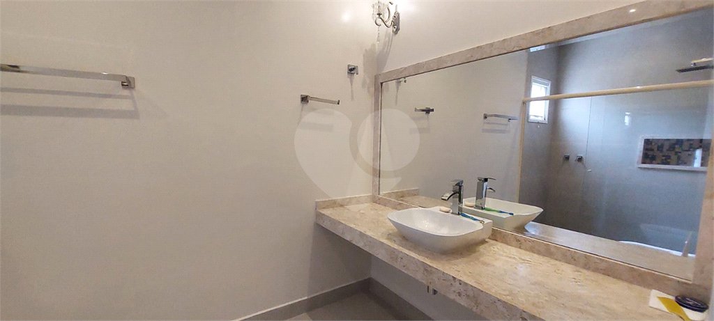 Casa à venda com 3 suítes no condomínio Figueira Garden, Atibaia - SP