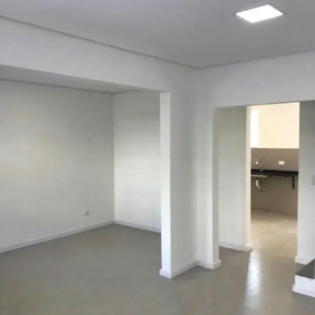 Casa com 3 dormitórios à venda, 116 m² por R$ 690.000,00 - Gonzaga - Santos/SP
