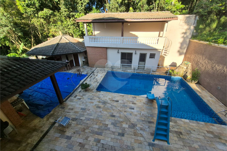 Casa à venda com 4 suítes no condomínio Alpes da Cantareira, Mairiporã - SP
