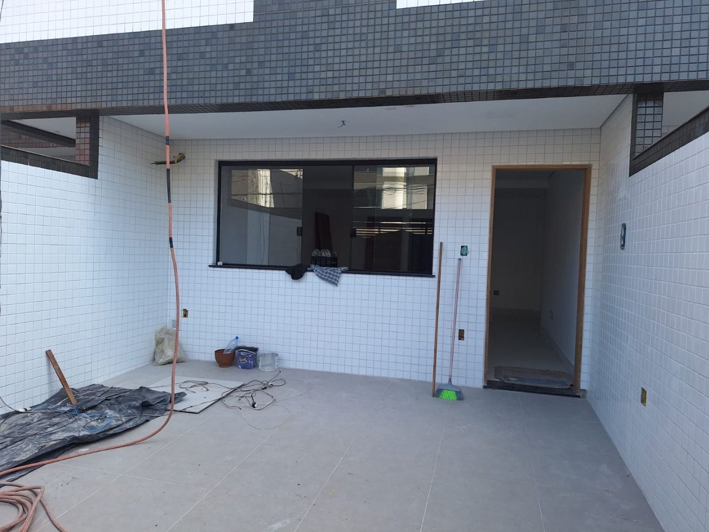 Casa com 3 dormitórios à venda, 140 m² por R$ 1.580.000,00 - Ponta da Praia - Santos/SP