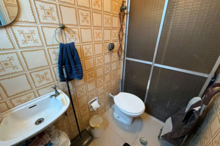 Apartamento com 2 dormitórios e suíte + dependência de serviço completa na Ponta da Praia – Localização privilegiada próximo à Praça Dino Bueno