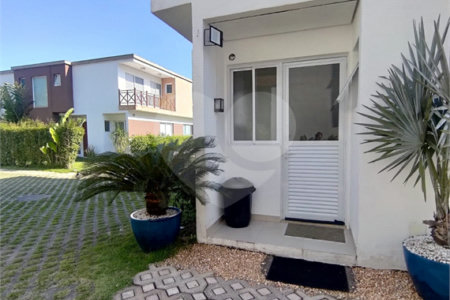 Casa à venda ou para alugar com 4 suítes no condomínio Sambaqui, São Sebastião - SP