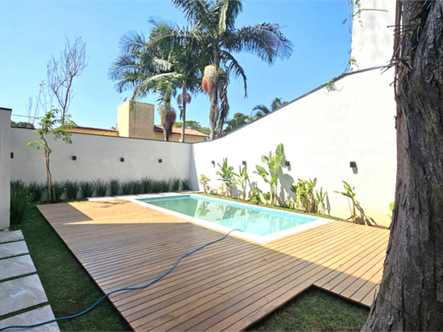 Casa à venda com 4 suítes no condomínio Villa Suiça, São Paulo - SP