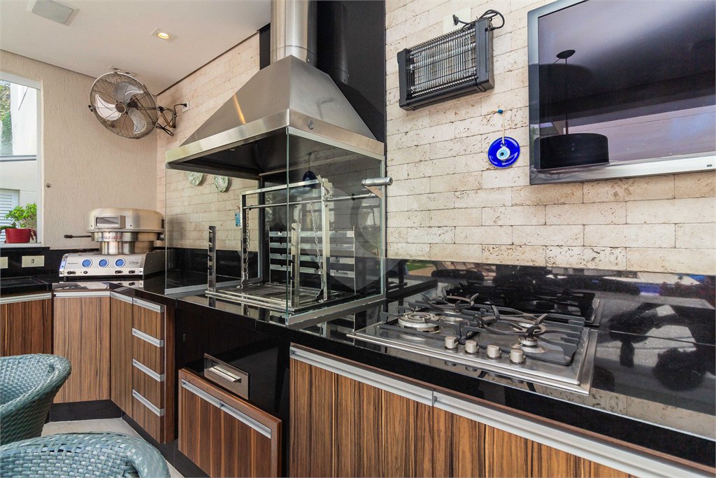 Casa à venda com 4 suítes no condomínio Residencial Quinta das Andorinhas, São Paulo - SP