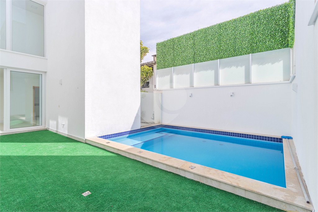Casa à venda com 4 suítes no condomínio Villagio Quadrifolio, São Paulo - SP