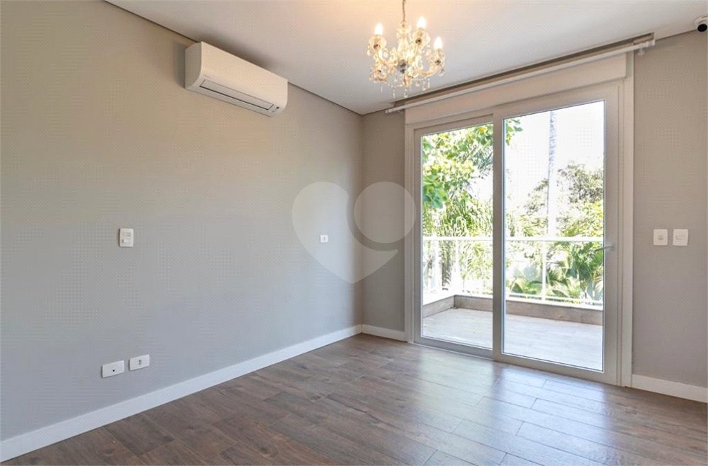 Casa à venda com 4 suítes no condomínio Hípica Garden, São Paulo - SP
