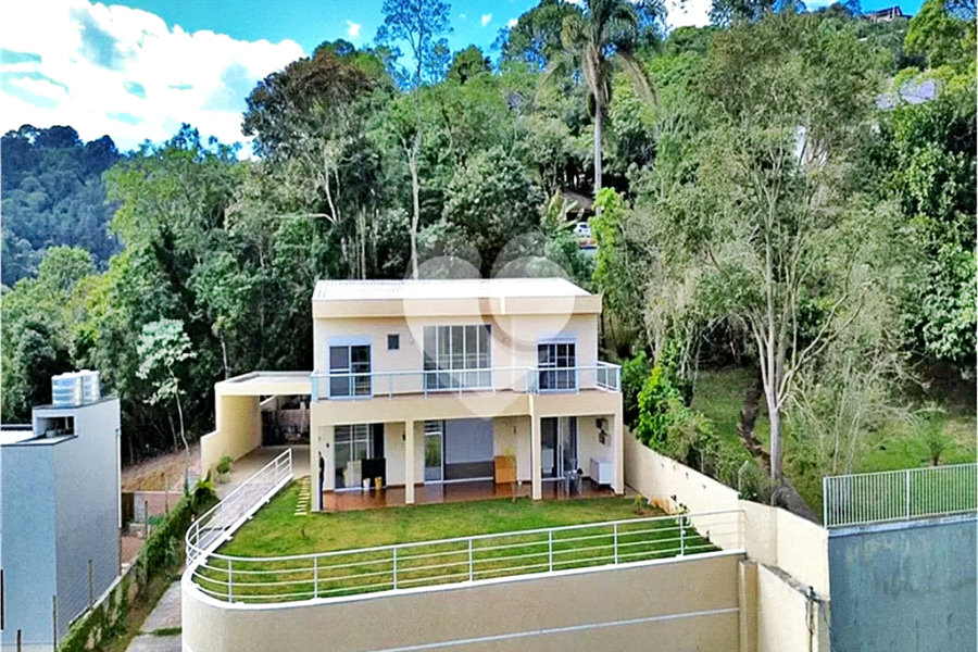 Casa à venda com 4 suítes no condomínio Alpes da Cantareira, Mairiporã - SP