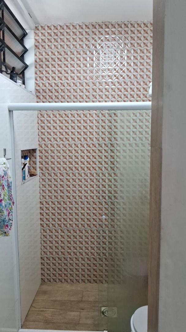 Sobrado com 3 dormitórios à venda, 150 m² por R$ 780.000,00 - Estuário - Santos/SP