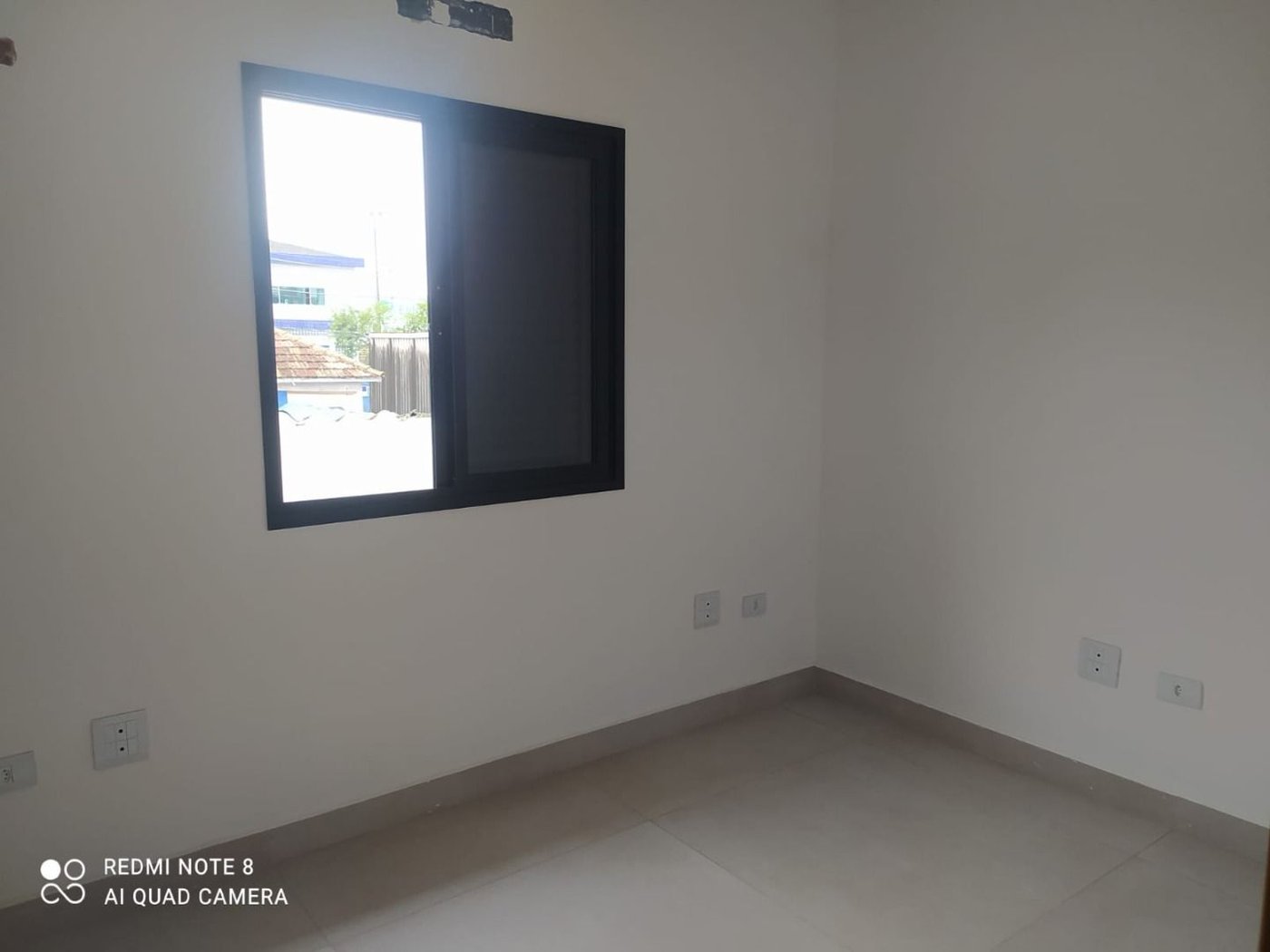 Sobrado com 3 dormitórios à venda, 107 m² por R$ 825.000,00 - Estuário - Santos/SP