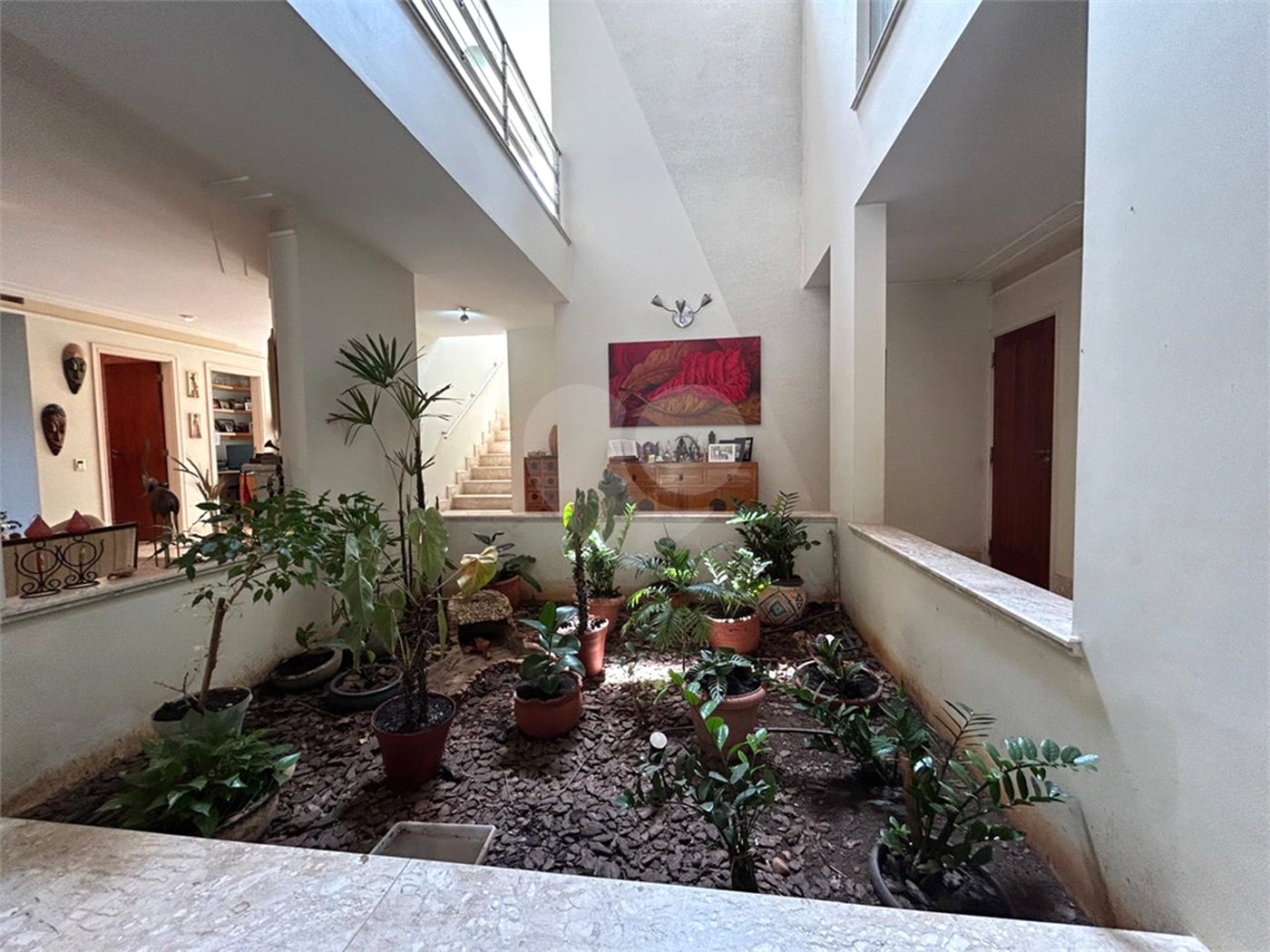 Casa à venda com 5 suítes no condomínio Residencial Bougainville, Campinas - SP