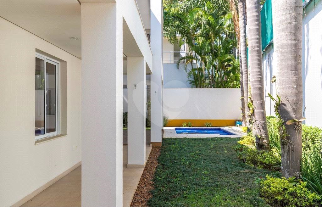 Casa à venda com 4 suítes no condomínio Vila Alba, São Paulo - SP