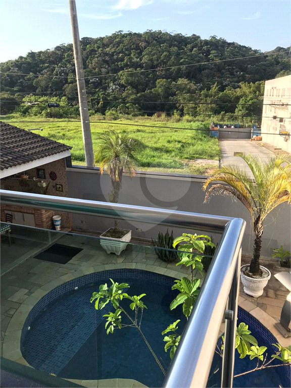 Casa à venda com 4 suítes no condomínio Aruã, Mogi das Cruzes - SP