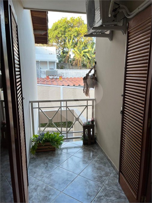 Casa à venda com 3 quartos, sendo 2 suítes, no condomínio Palmas, São Paulo - SP