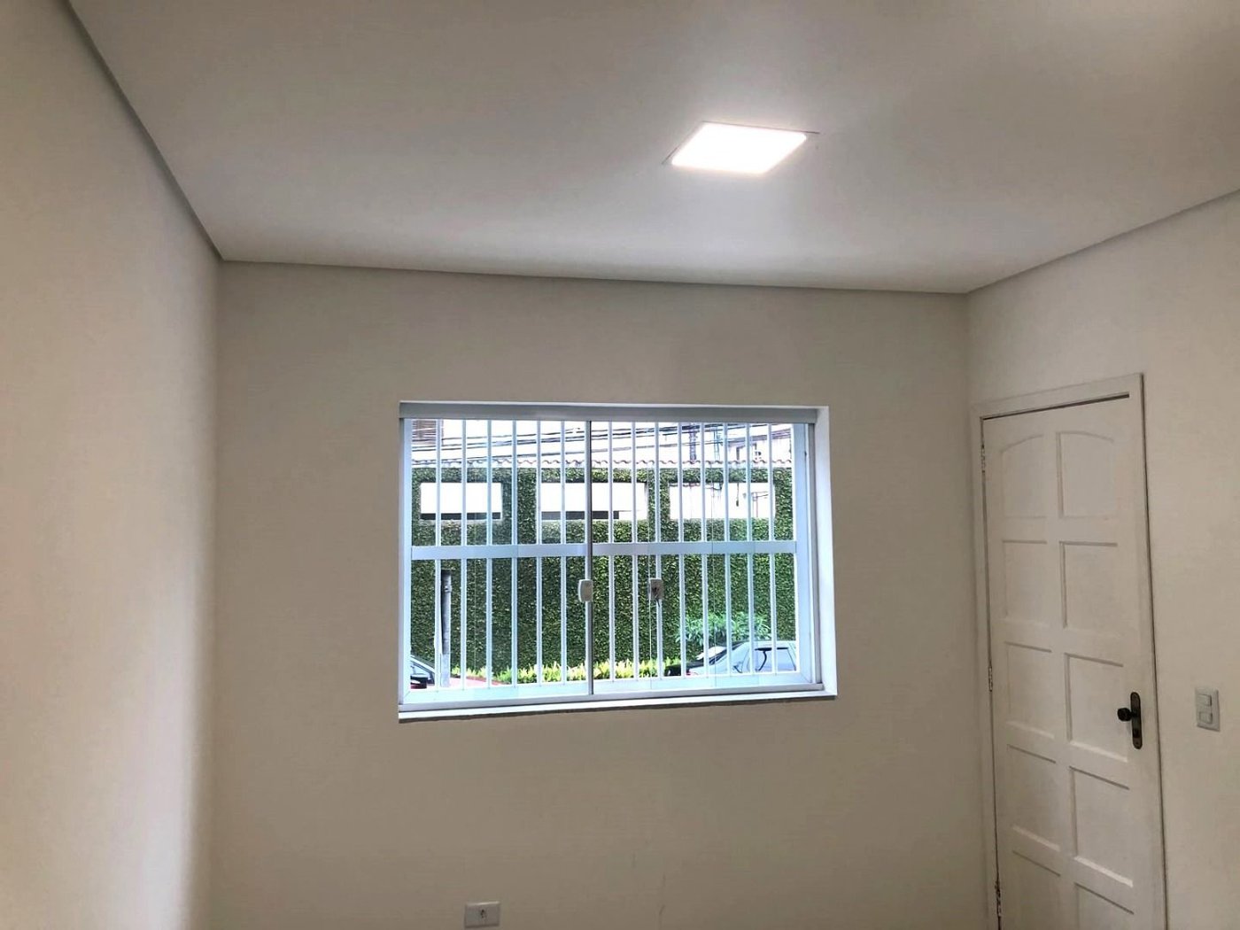 Casa com 3 dormitórios à venda, 116 m² por R$ 690.000,00 - Gonzaga - Santos/SP