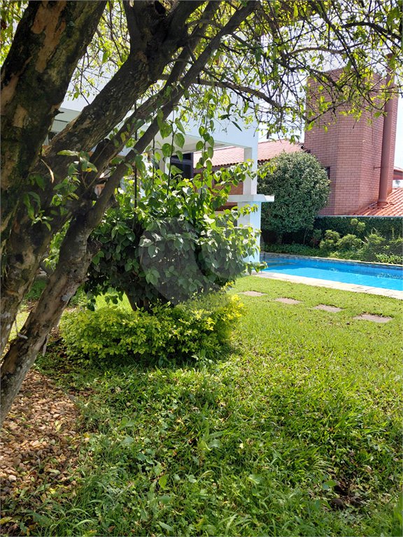 Casa à venda com 4 suítes no condomínio Ville Bourghese, São Paulo - SP