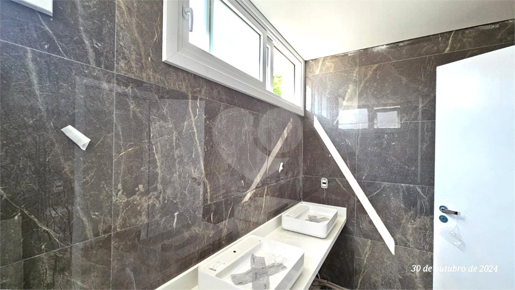 Casa à venda com 4 suítes no condomínio Garda, São Paulo - SP