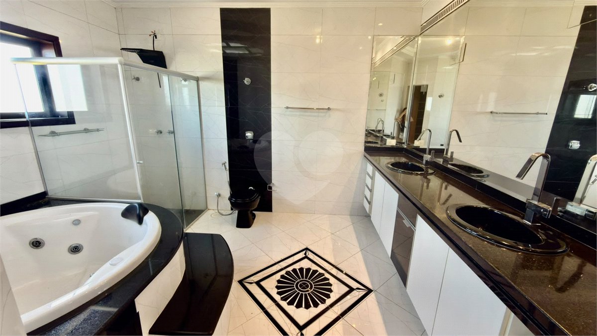 Casa à venda com 4 suítes no condomínio Parque Village Castelo, Itu - SP