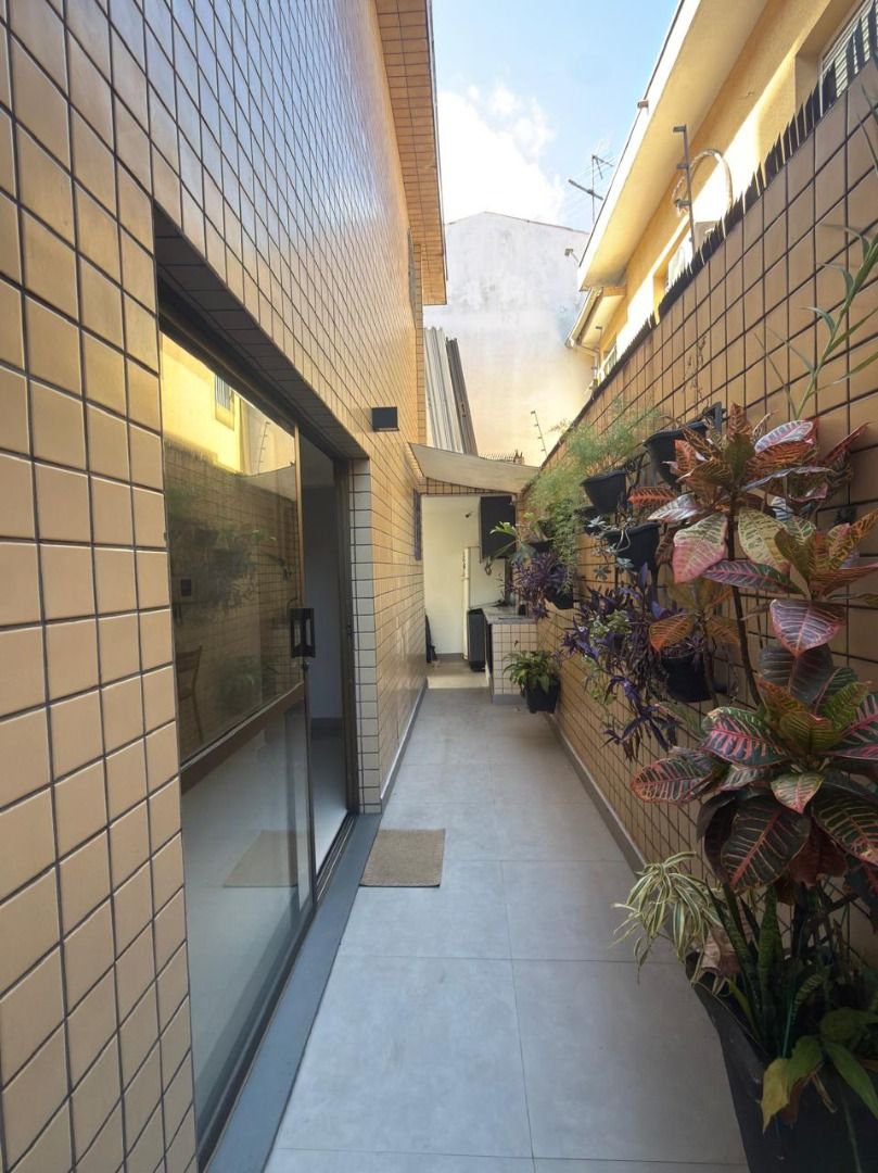 Casa com 4 dormitórios à venda, 127 m² por R$ 1.440.000,00 - Ponta da Praia - Santos/SP
