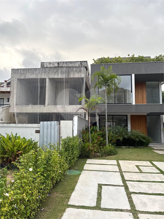 Casa à venda com 4 suítes no condomínio Riomar X, Rio de Janeiro - RJ