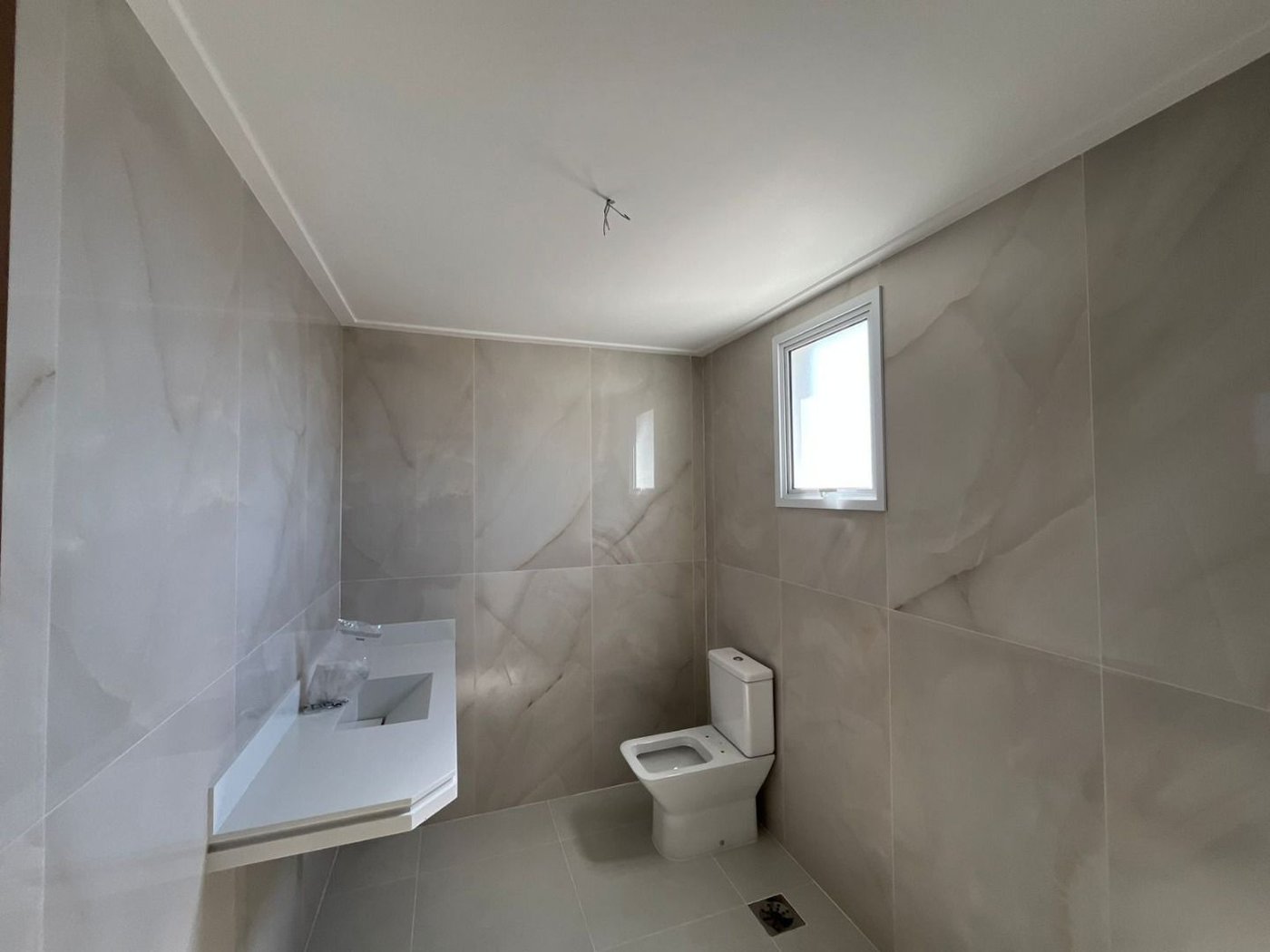 Apartamento Garden de Alto Padrão na Quadra da Praia – Exclusividade e Sofisticação na Aparecida, Santos