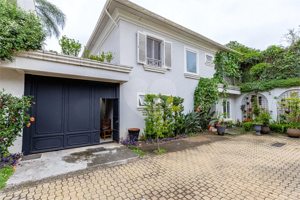 Casa à venda com 4 suítes no condomínio Saint Germain, São Paulo - SP