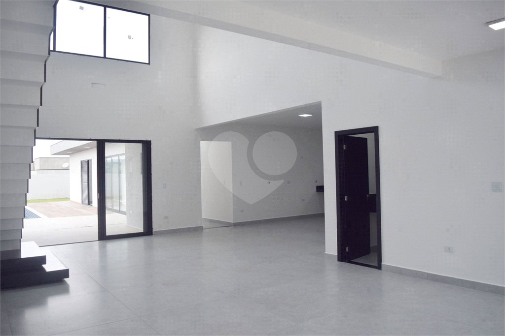 Casa à venda com 4 suítes no condomínio Figueira Garden, Atibaia - SP