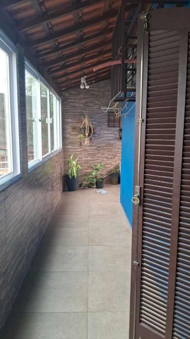 Sobrado com 3 dormitórios à venda, 150 m² por R$ 780.000,00 - Estuário - Santos/SP