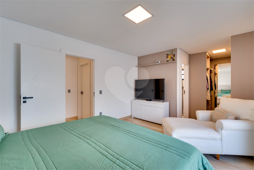 Casa à venda com 4 suítes no condomínio Villa Suiça, São Paulo - SP