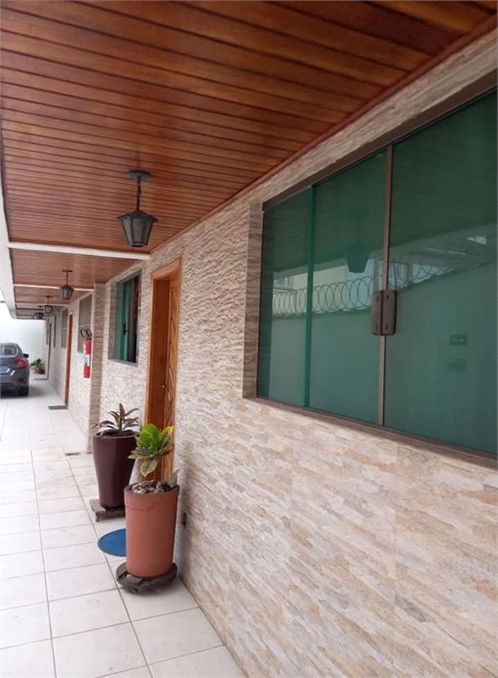 Casa com 2 dormitórios para alugar, 100 m² por R$ 5.000,00 - Macuco - Santos/SP