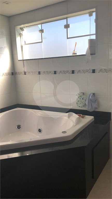 Casa à venda com 4 suítes no condomínio Aruã, Mogi das Cruzes - SP