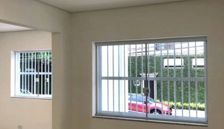Casa com 3 dormitórios à venda, 116 m² por R$ 690.000,00 - Gonzaga - Santos/SP