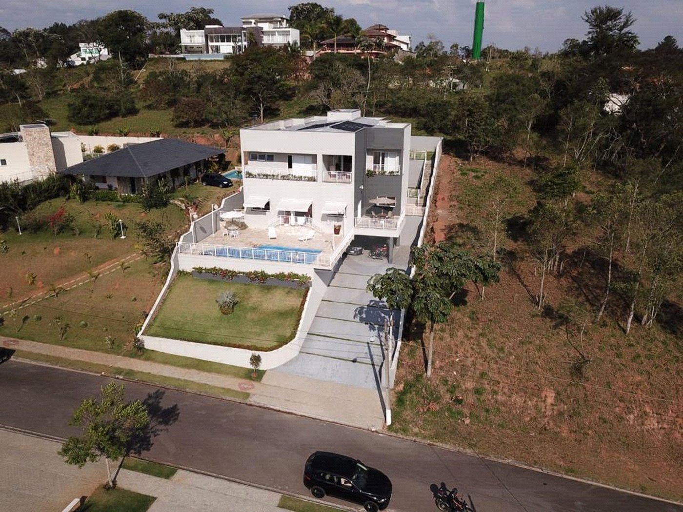 Casa à venda com 4 suítes no condomínio Reserva Ibirapitanga Ii, Santa Isabel - SP